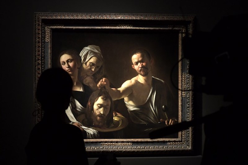 The oil painting on canvas called u00e2u20acu02dcSalome with the Head of John the Baptistu00e2u20acu2122 by Caravaggio is displayed during the press preview of the exhibition u00e2u20acu02dcInside Caravaggiou00e2u20acu2122 in Milan September 28, 2017. u00e2u20acu201d AFP pic