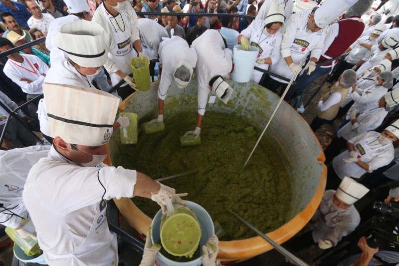 Volunteers from a culinary school mix mashed avocados as they attempt to set a new Guinness World Record for the largest serving of guacamole in Concepcion de Buenos Aires, Jalisco, Mexico September 4, 2017. u00e2u20acu201d Reuters pic