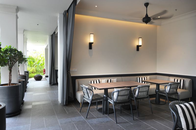 The open air lounge at the back of the hotel where guests can relax. — Picture by KE Ooi