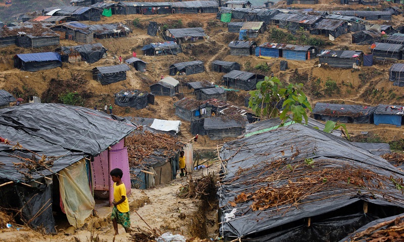 Rohingya refugees play outside their temporary shelters at a camp in Cox's Bazar, Bangladesh September 18, 2017. REUTERS/Danish Siddiqui TPX IMAGES OF THE DAY