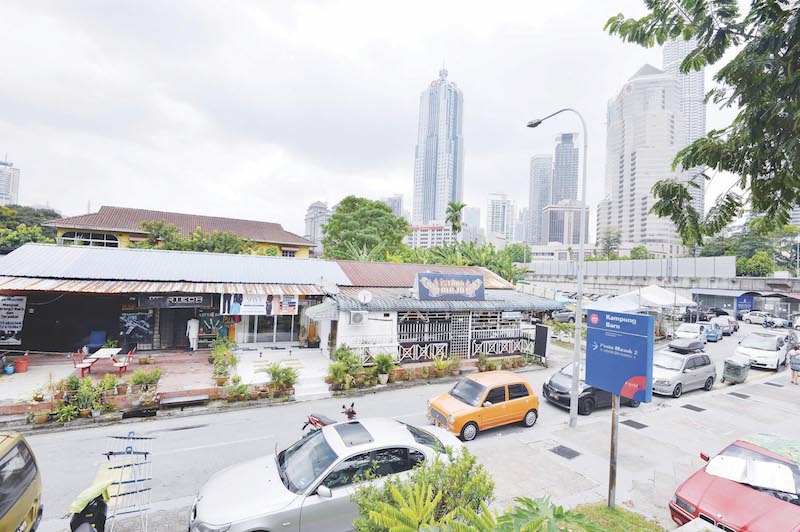 A contrast between the old and the new in Kampung Baru as seen from the LRT station. u00e2u20acu201d Malay Mail pic