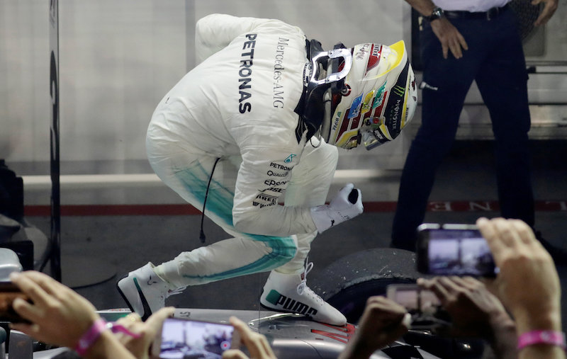 Mercedesu00e2u20acu2122 Lewis Hamilton celebrates winning the Singapore Grand Prix 2017 on September 17, 2017. u00e2u20acu201d Reuters pic