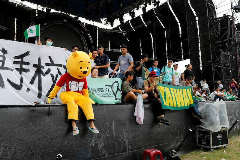 A student dressed in a Winnie the Pooh costume to mock Chinese President Xi Jinping sits on the stage to protest against a popular Chinese talent show u00e2u20acu02dcSing! Chinau00e2u20acu2122 at National Taiwan University, in Taipei, September 24, 2017. u00e2u20acu201d Reuters pic