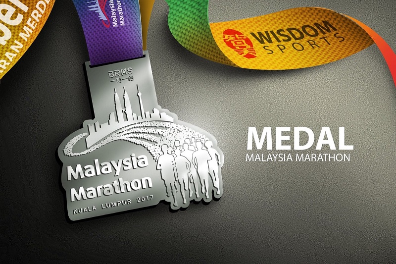 An impression of the finishersu00e2u20acu2122 medal for the Malaysia Marathon Kuala Lumpur 2017. (Inset) Logo of the marathon. u00e2u20acu201d Pictures by Facebook/@malaysiamarathonofficial
