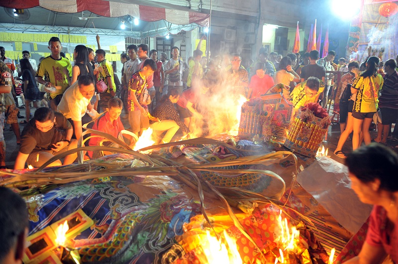 All paper items from the Tai Su Yeah clothing to hell money are burnt as offering at the end of the prayer session in George Town September 8, 2017. 