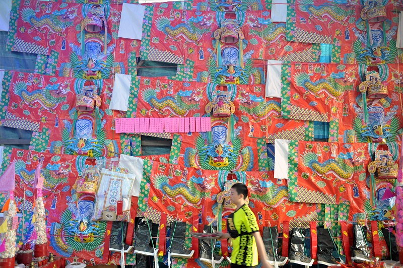 Devotees can also put up paper clothing to Tai Su Yeah as an offering during the Hungry Ghost Festival in George Town September 8, 2017. 