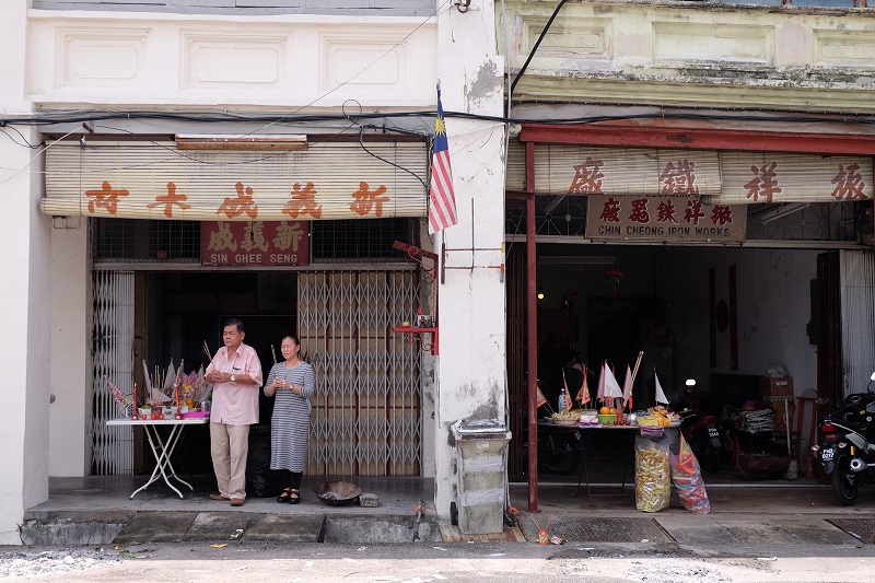 It is common for traders and businesses to set up tables and place offerings to appease the spirits during Hungry Ghost Month.