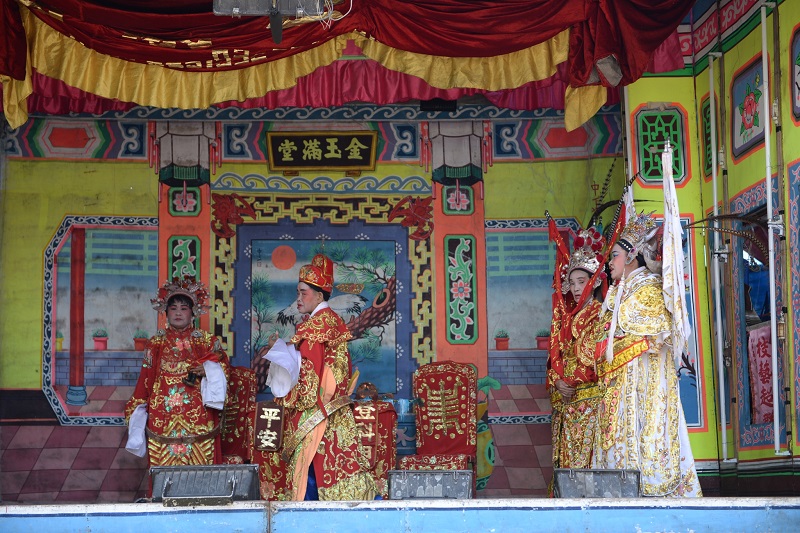 The traditional Chinese opera performance to entertain the hungry ghosts during the seventh lunar month.