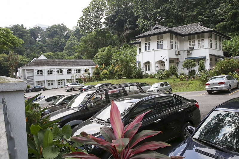 A view now of the unaltered manse and carpark where the tennis court was once located, and also the 1988 extension and addition to the original church building. — Picture by Choo Choy May 