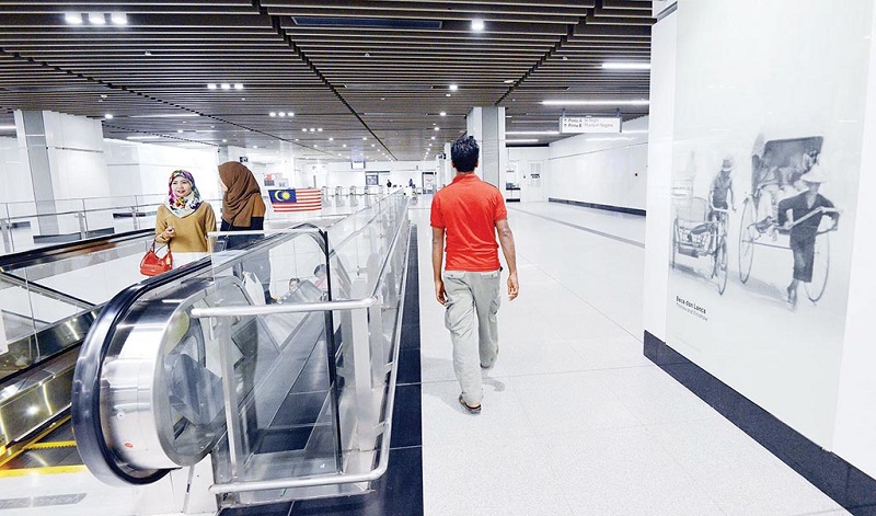 The photo of the trishaw and rickshaw side by side at the Muzium Negara MRT station. u00e2u20acu201d Picture by Malay Mail