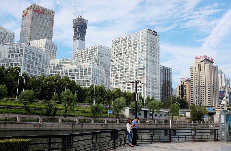 People rest at a park near Beijingu00e2u20acu2122s central business area, China August 29, 2017. u00e2u20acu201d Reuters pic