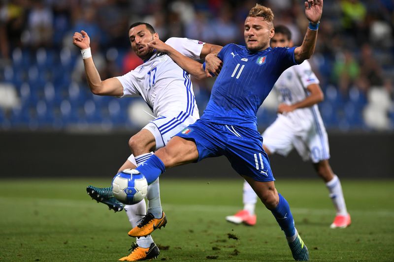Italyu00e2u20acu2122s Ciro Immobile in action with Israelu00e2u20acu2122s Shir Tzedek during their 2018 World Cup Qualification match in Reggio Emilia, Italy, September 5, 2017. u00e2u20acu201d Reuters pic