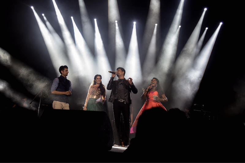 Emcees Aanantha, Pritha Manivannan and Shangkharee Nadarajan speak to Aalap Raju during an interval. — Picture courtesy of Mojo Projects