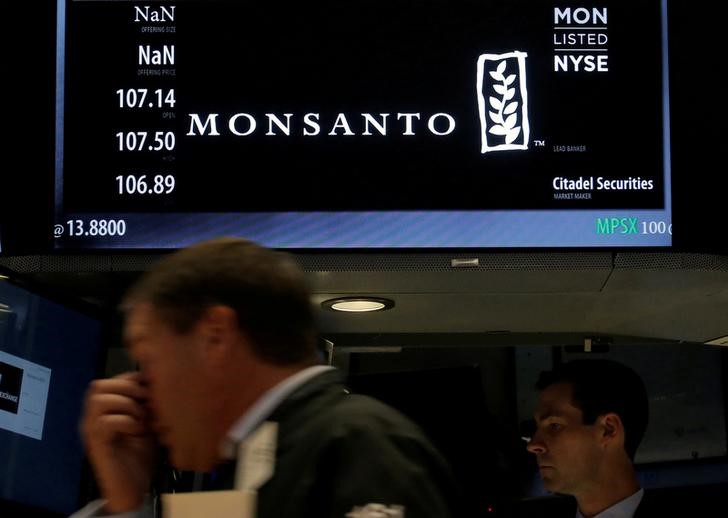 A trader works at the post where Monsanto Co is traded on the floor of the New York Stock Exchange in New York City, August 25, 2016. u00e2u20acu201d Reuters pic
