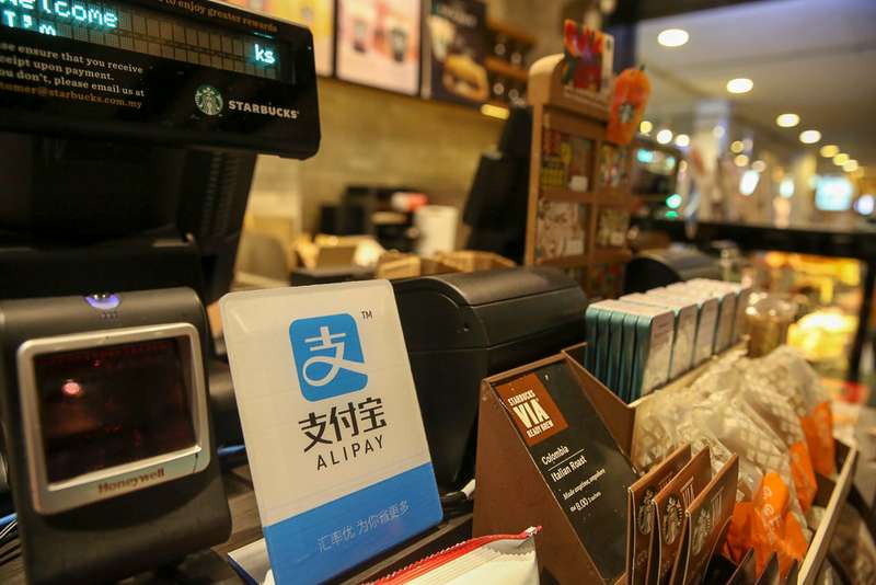 Malaysians will see more and more businesses put up this Alipay sign over the next few months. u00e2u20acu201d Picture by Choo Choy May