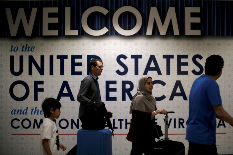 International passengers arrive at Washington airport pending further judicial review of the travel ban, in Dulles, Virginia  June 26, 2017. u00e2u20acu201d Reuters pic 