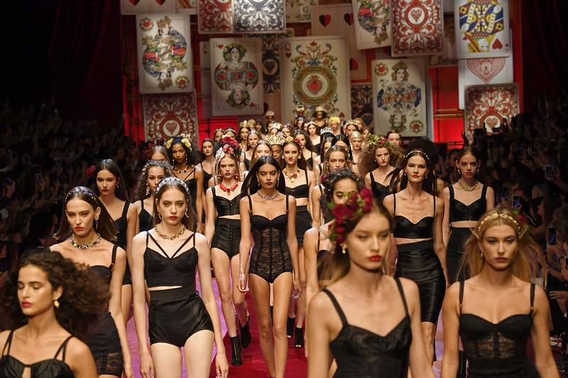 Before the Dolce & Gabbana show (September 24, 2017) at least 100 uninvited guests leaned on the security barriers, mobile phones at the ready, as the black Mercedes dropped off important clients, fashion bigwigs and celebrities. u00e2u20acu201d AFP pic