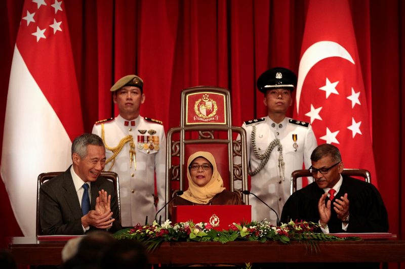 Halimah Yacob (centre) was sworn-in Sept 14 as Singapore's eighth president. u00e2u20acu201d TODAY pic