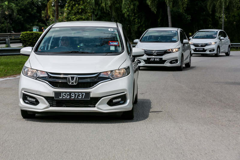 The Honda Jazz Hybrid on the road.