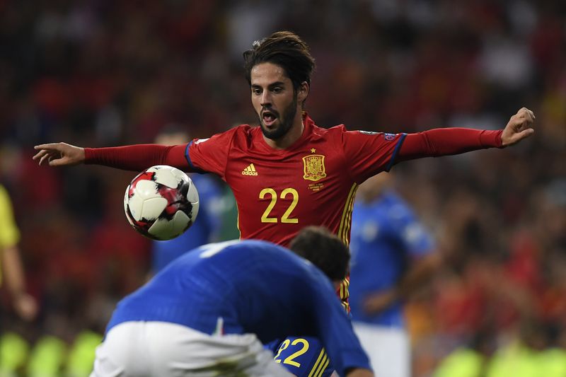 Spainu00e2u20acu2122s midfielder Isco eyes the ball during the World Cup 2018 qualifier football match Spain vs Italy at the Santiago Bernabeu stadium in Madrid, September 2, 2017. Spain won 3-0. u00e2u20acu201d AFP pic