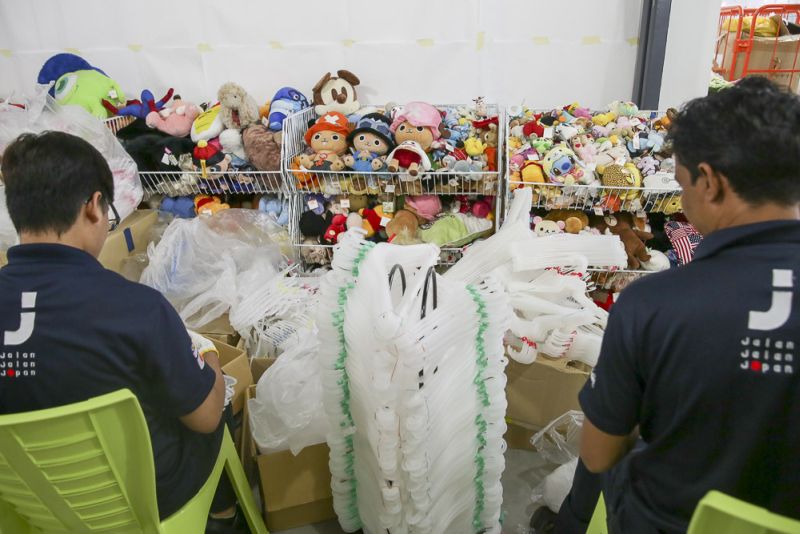 With weekly shipments, there are plenty to arrange on the shelves and racks. 