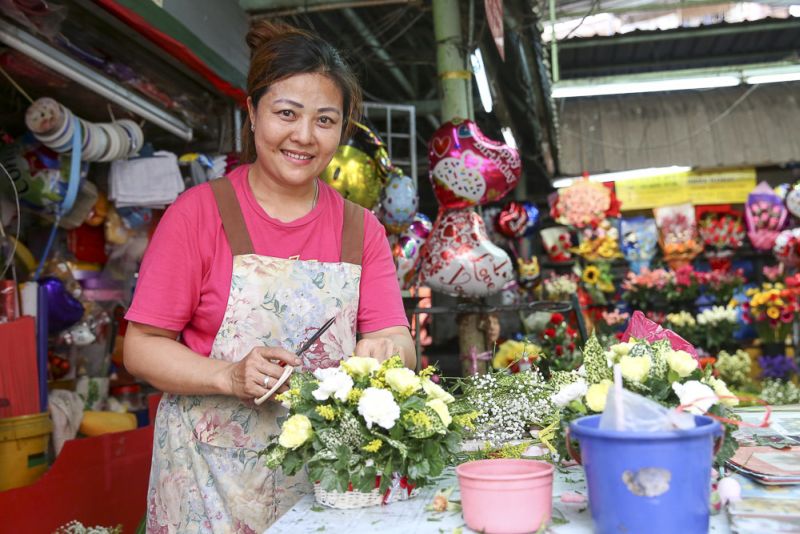 Florist Carol Low at her shop in Jalan Masjid India, Kuala Lumpur.
