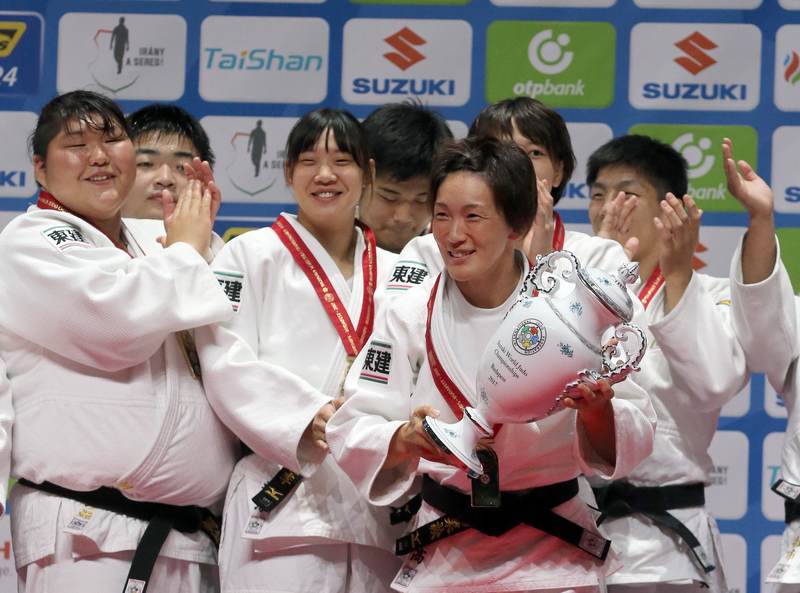Gold winners Japan celebrate on the podium of the team event at the World Judo Championships in Budapest September 3, 2017. u00e2u20acu201d AFP pic