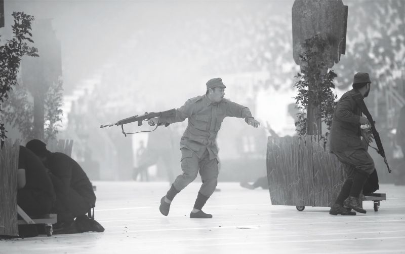 A scene from the re-enactment of u00e2u20acu02dcOps Tapahu00e2u20acu2122 at Dataran Merdeka yesterday. u00e2u20acu201d Picture by Farhan Najib