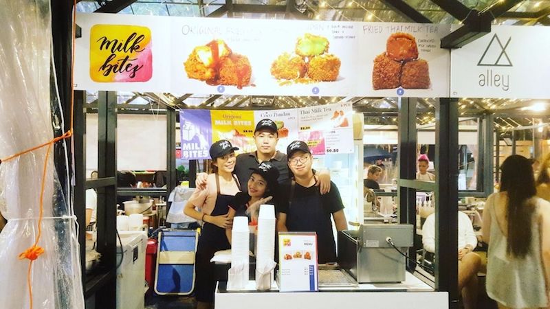 Financial planner Jacquelin Liew (left), 23, launched Milk Bites at this yearu00e2u20acu2122s Geylang Serai bazaar. The number of younger stall owners is said to be rising. u00e2u20acu201d TODAY pic