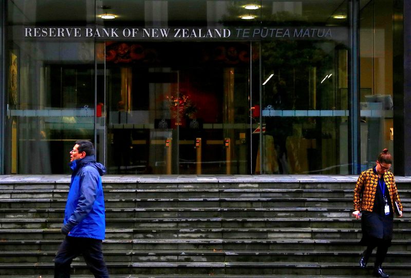 Pedestrians walk near the main entrance to the Reserve Bank of New Zealand located in central Wellington September 25, 2017. u00e2u20acu201d Reuters pic