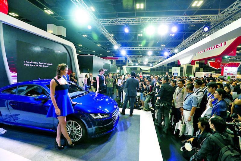 The crowd gathering at one of the previous editions of the Singapore MotorShow held at the Suntec Singapore Convention & Exhibition Centre. u00e2u20acu201d TODAY pic