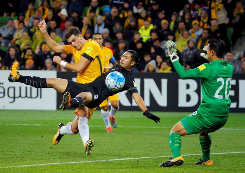 Tomi Juric of Australia and Adisorn Promrak of Thailand in action during their 2018 World Cup qualifications match in Melbourne, September 5, 2017. u00e2u20acu201d Reuters pic