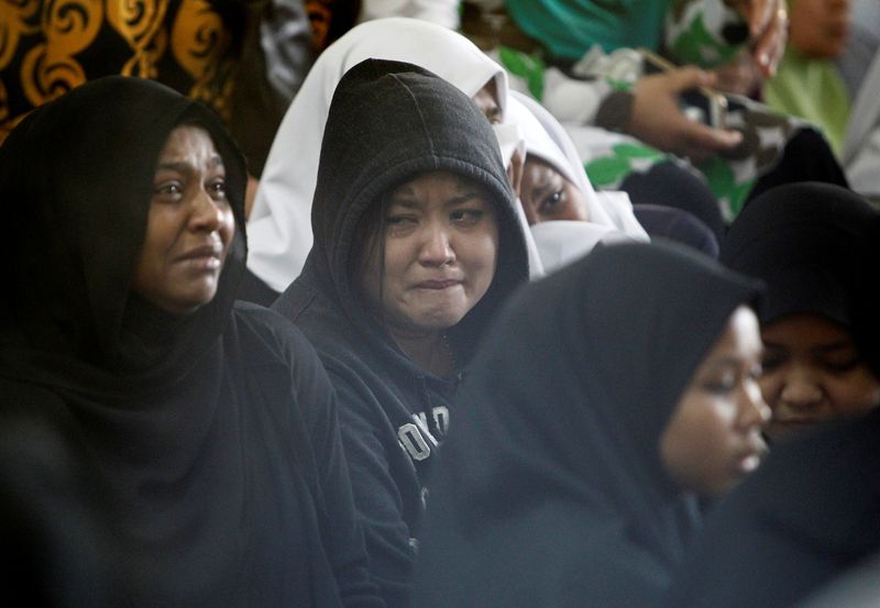 Family members wait for news of their loved ones outside religious school Darul Quran Ittifaqiyah after a fire broke out in Kuala Lumpur September 14, 2017.u00c2u00a0u00e2u20acu201d Reuters pic