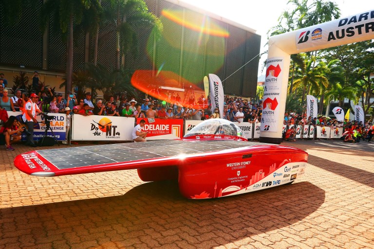 This handout from the World Solar Challenge 2017 taken and received on October 8, 2017 shows Western Sydney Solar Team vehicle u00e2u20acu02dcUnlimited 2.0u00e2u20acu2122 from Australia leaving the start line in Darwin. u00e2u20acu201d AFP pic