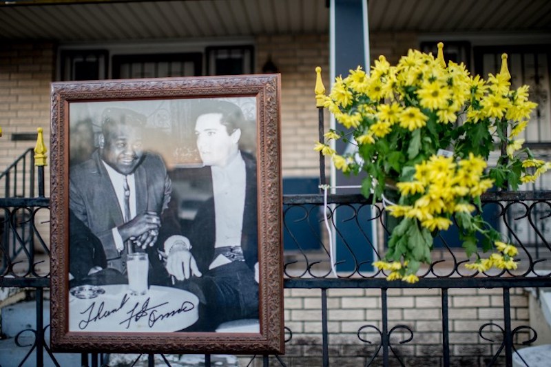 A photo of Fats Domino and Elvis Presley sits on the fence at Fats Dominou00e2u20acu2122s memorial outside of his old home in the Lower 9th Ward in New Orleans October 25, 2017. Fats Domino died on October 24, 2017. He was 89. u00e2u20acu201d AFP pic