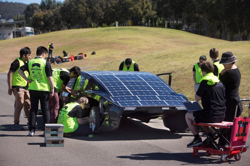 Members of the University of New South Wales Sunswift team work with their new car u00e2u20acu02dcVioletu00e2u20acu2122 during testing in Penrith western Sydney, Australia, in this picture taken September 1, 2017 and distributed to Reuters September 20, 2017. u00e2u20acu201d Quentin Jones/U
