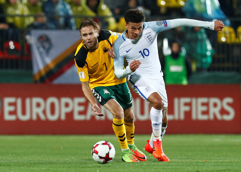 Englandu00e2u20acu2122s Dele Alli in action with Lithuaniau00e2u20acu2122s Arturas Zulpa in their 2018 World Cup Qualifications match in Vilnius October 8, 2017. u00e2u20acu201d Reuters pic