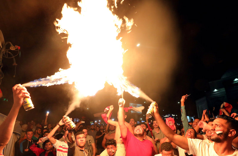 Egyptians celebrate qualifying for the 2018 World Cup in Cairo October 8, 2017. u00e2u20acu201d Reuters pic