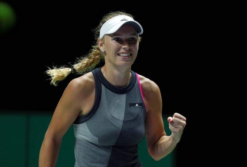 Denmarku00e2u20acu2122s Caroline Wozniacki celebrates winning her group stage match with Ukraineu00e2u20acu2122s Elina Svitolina at the WTA Tour Finals in Singapore October 23, 2017. u00e2u20acu201d Reuters pic