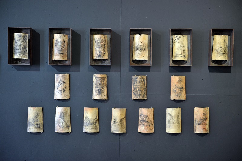 Chinese ink paintings on heritage roof tiles by Lijynn. u00e2u20acu201d Picture by KE Ooi