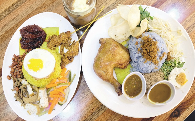 Nasi Kerabu (right) is among the dishes at Ten Years Restaurant. 