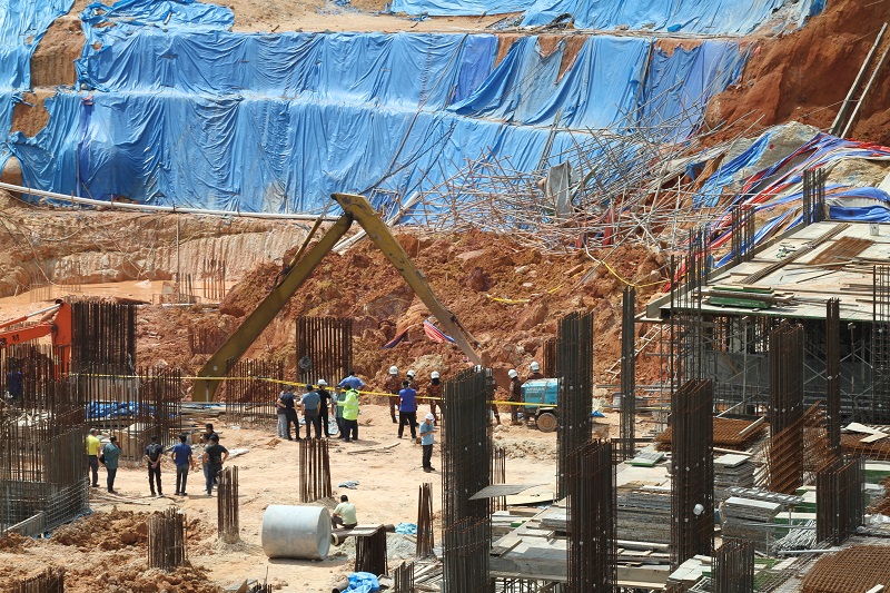 Police bring out a body from the site, Penang, October 21, 2017. u00e2u20acu201d  Picture by KE Ooi