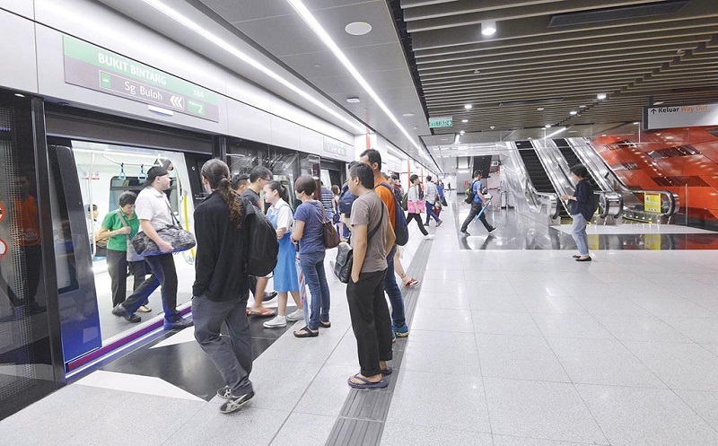 Commuters at the Pavilion Kuala Lumpur-Bukit Bintang MRT station. u00e2u20acu201d Picture by Ham Abu Bakar