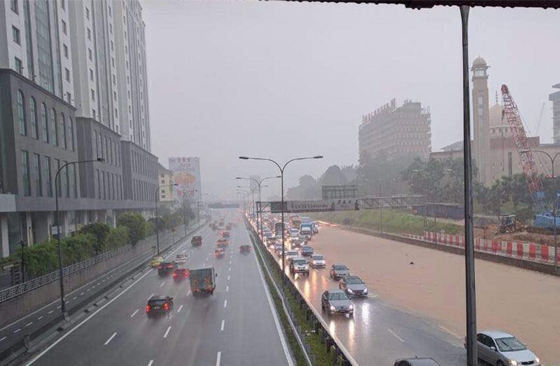 A photo posted on the social media showing the flooded section of the highway. Federal Highway flooded after downpour.