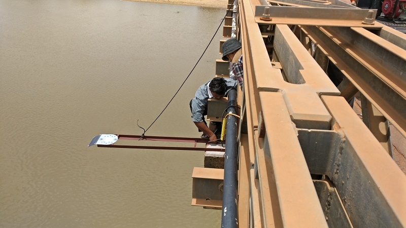 An automated water gauge to help predict floods is fixed to a bridge over a river in Cambodia in this handout picture by People In Need. u00e2u20acu201d Reuters pic
