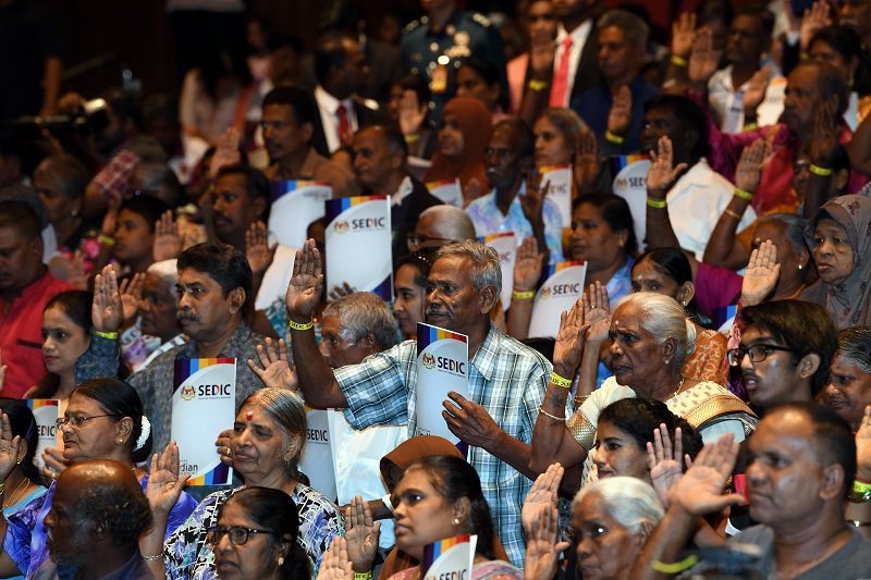 Malaysian Indians take an oath in front of Prime Minister Datuk Seri Najib Razak after receiving their citizenship documents in Kuala Lumpur October 31, 2017. u00e2u20acu201d Bernama pic