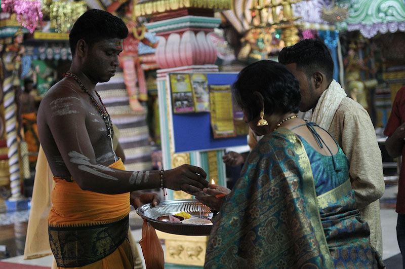 Hindu devotees perform Deepavali prayers at a temple in Puchong, Selangor, October 18, 2017. u00e2u20acu201d Picture by Miera Zulyana