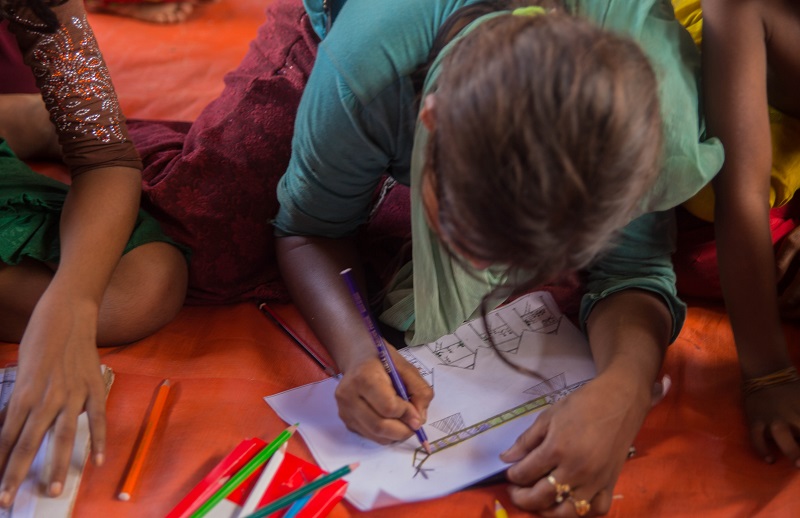 Children are drawing and playing games at a child-friendly-space at the Balukhali refugee camp in Bangladesh October 15, 2017. u00e2u20acu201d Thomson Reuters Foundation pic
