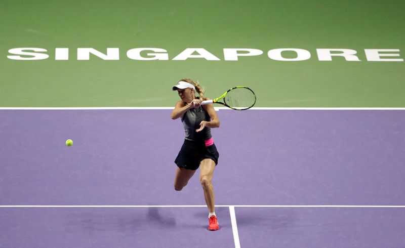 Denmarku00e2u20acu2122s Caroline Wozniacki in action during the WTA Tour Finals against USAu00e2u20acu2122s Venus Williams at the Singapore Indoor Stadium, October 29, 2017. u00e2u20acu201d Reuters pic