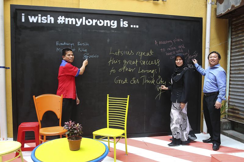 Programme Director, Dr Neil Khor, DBKL Director of Project Implementation & Building Maintenance, Mohd Sahak Surip (left) and his deputy, Sharifah Junidah Syed Omar are pictured during the launch of Think Cityu00e2u20acu2122s Demonstrative Laneway Improvement Program